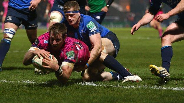 Neil Clark dives over for Leinster's first try