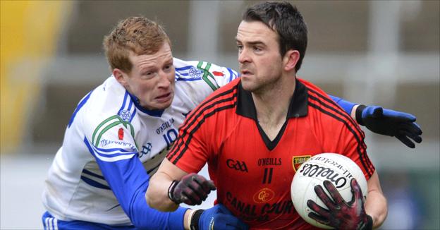 Mark Poland shields the ball from Kieran Hughes during Monaghan's victory over Down