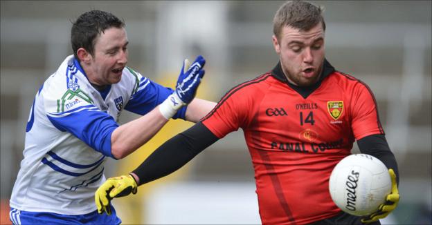 Arthur McConville of Monaghan and Down's Owen Duffy in action at the Athletic Grounds in Armagh