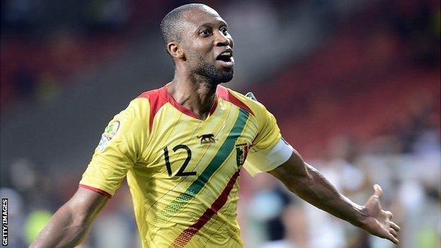 Mali's Seydou Keita celebrates scoring against Niger