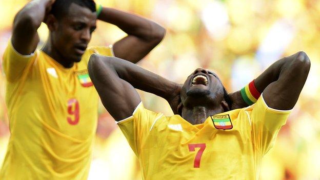 Ethiopian players react during their game against Zambia