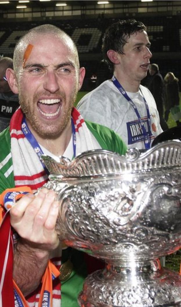 Cliftonville midfielder Barry Johnston is delighted to get his hands on the League Cup