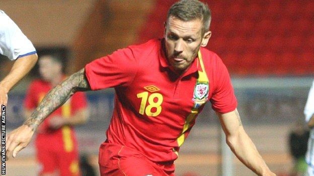 Craig Bellamy in action for Wales.