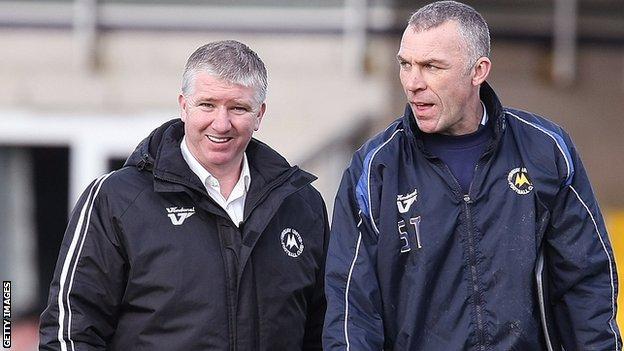 Martin Ling (right) has left Torquay in the hands of his assistant Shaun Taylor (left)