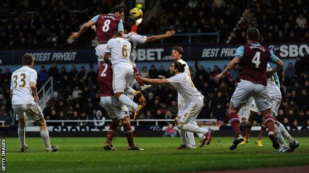 West Ham's Andy Carroll scores