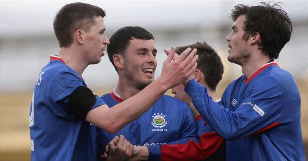 Linfield players congratulate goalscorer Brian McCaul