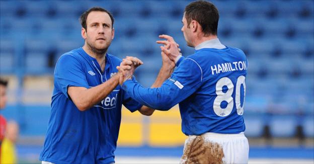 Guy Bates and Gary Hamilton celebrate after one of Glenavon's three goals