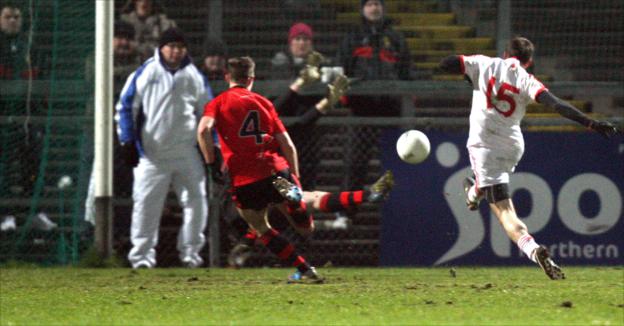 Mark Donnelly scores a goal during Tyrone's three-point win over Down in Football League Division One