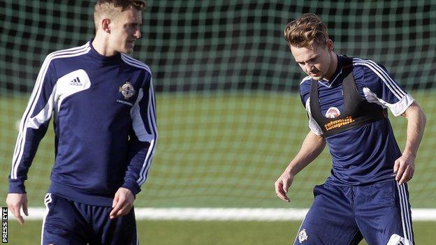Adam McGurk (right) and Dean Shiels at Northern Ireland training on Monday