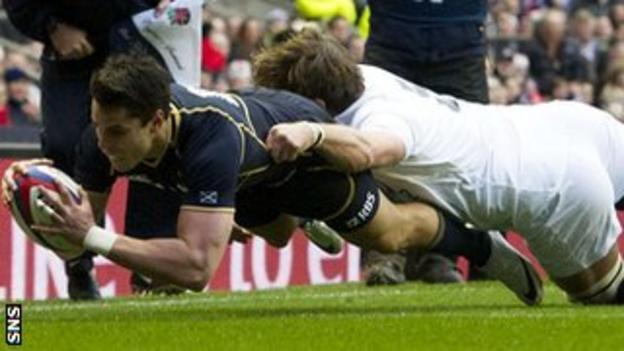 Sean Maitland plunges over for an early try at Twickenham