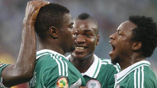 Elderson Echiejile is congratulated by team-mates after openign the scoring for Nigeria