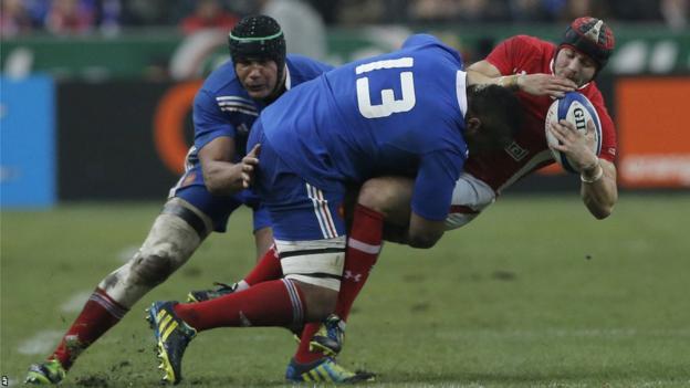 France centre Mathieu Bastareaud clatters Wales full-back Leigh Halfpenny