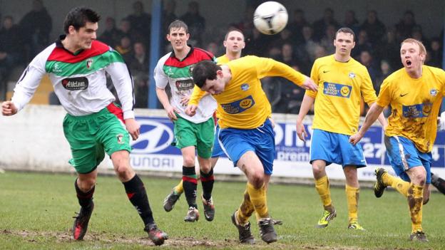 Jimmy Callacher heads in Glentoran's second goal in their 5-2 sixth round win over Bangor at Clandeboye Park