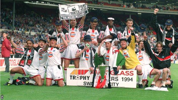 Swansea City players celebrate their Autoglass Trophy win in 1994