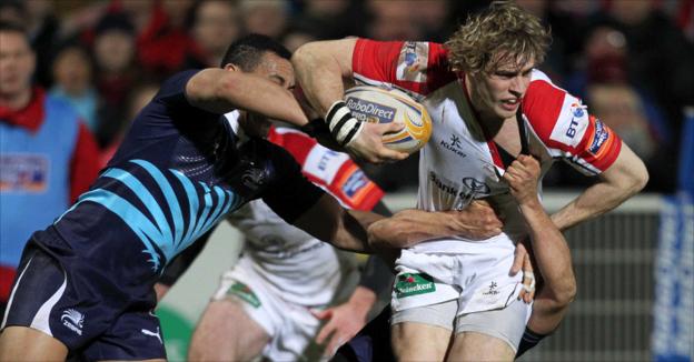Ulster wing Andrew Trimble attempts to escape the attention of Paolo Buso and Sinoti Sinoti
