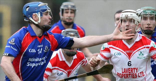Richard Murray of St Thomas in action against Loughgiel's Martin Scullion during the hurling semi-final at Clones