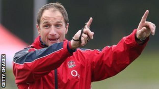 Mike Catt gestures during an England training session