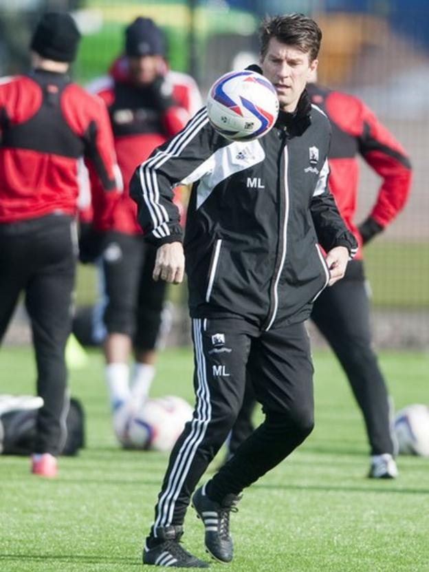 Swans boss Michael Laudrup shows his ball-control skills