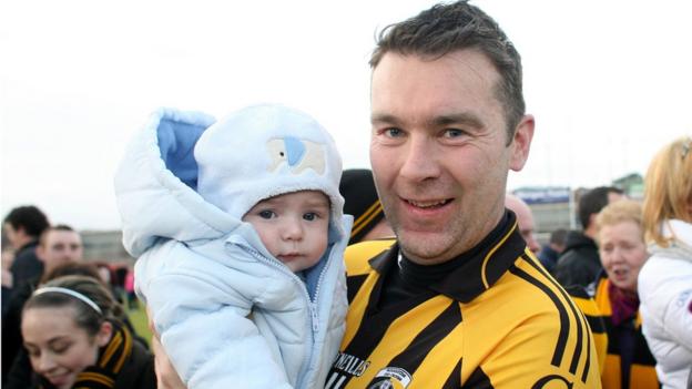 Oisin McConville pictured with his son Ryan after Crossmaglen's 3-9 to 0-11 over Pearse Og in the 2012 Armagh Club final