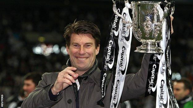 Swansea manager Michael Laudrup with the League Cup trophy