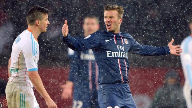 David Beckham came up against compatriot Joey Barton in a snowy Parc des Princes