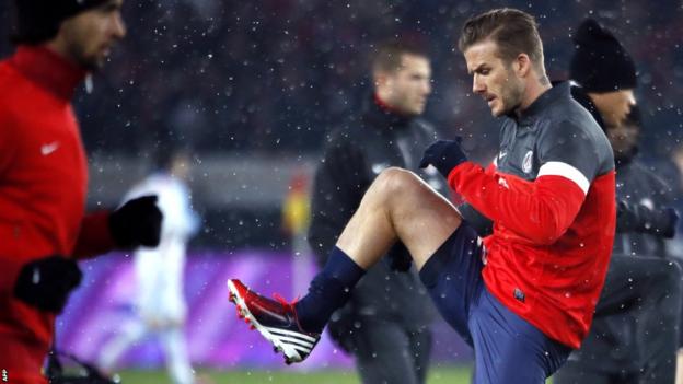David Beckham stretched and strained as he warmed up to face Marseille