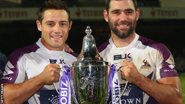 Melbourne Storm's Cameron Smith and Cooper Cronk with the World Club Challenge trophy