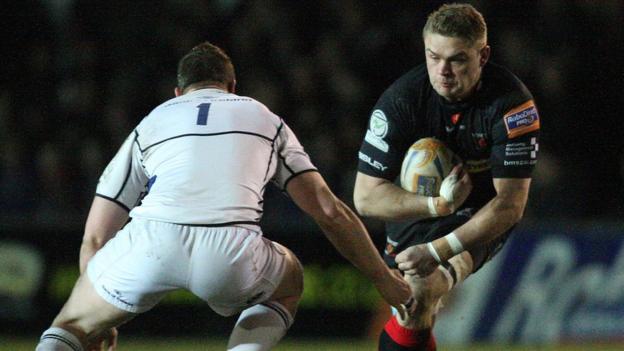 Newport Gwent Dragon Lewis Evans takes on Leinster's Jack O'Connell