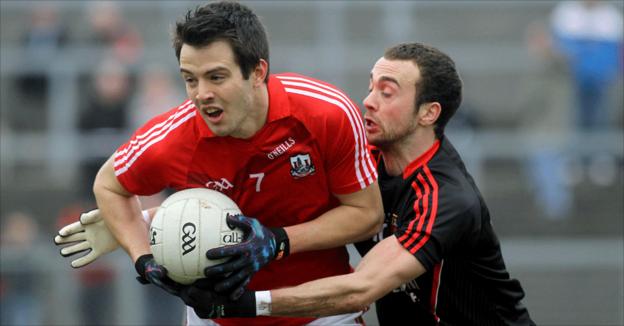Cork's Jamie O'Sullivan and Conor Laverty of Down in action at Pairc Esler