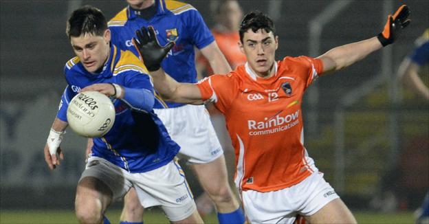 Longford's Shane Mulligan and Armagh's Caolan Rafferty vie for possession on saturday night