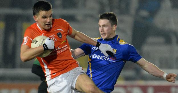 Stephen Harold shrugs off Michael Quinn as Armagh beat Longford in Division Two