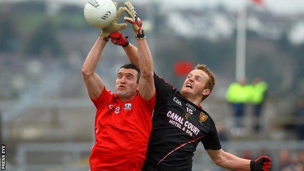Cork's Graham Canty battles with Down's Benny Coulter at Newry