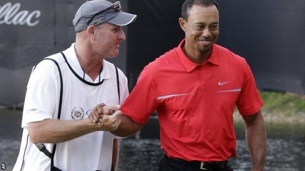Tiger Woods (right) and caddie Joe Lacava