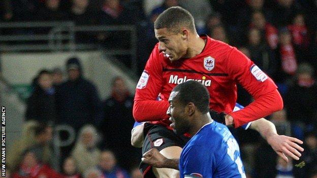 Rudy Gestede heads home Cardiff City's equaliser against Leicester City.