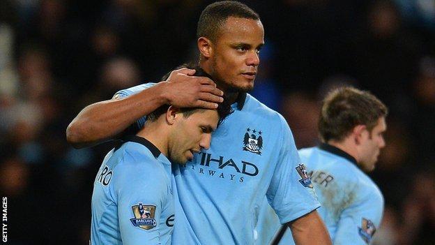 Manchester City's Sergio Aguero and Vincent Kompany