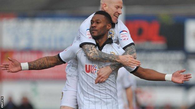 Jennison Myrie-Williams celebrates the first Vale goal with fellow scorer Lee Hughes
