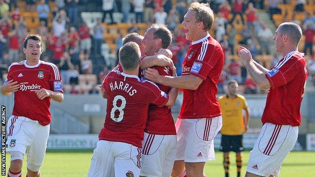 Wrexham players celebrate a goal