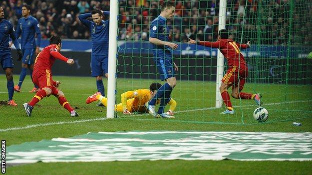 Pedro celebrates scoring for Spain against France