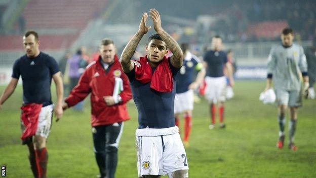 Liam Bridcutt and Scotland players at full time following the defeat by Serbia