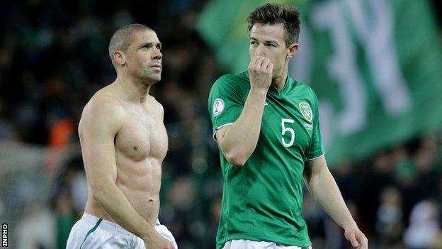 Jonathan Walters and Sean St Ledger walk off the pitch after the Republic's 2-2 draw against Austria