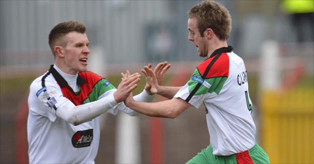 Richard Clarke celebrates after scoring with a curling right-foot shot in Glentoran's 5-4 defeat by Crusaders