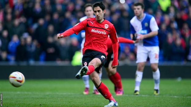 Peter Whittingham scores from the penalty spot deep in injury time to seal a 3-0 win for Cardiff over Blackburn and open up a seven-point lead at the top of the Championship