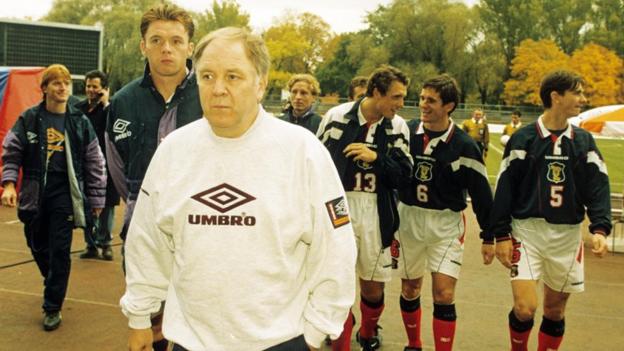 Craig Brown leads his Scotland side out