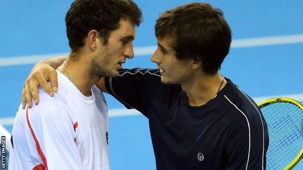 James Ward of Great Britain congratulates Evgeny Donskoy of Russia