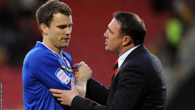 Cardiff boss Malky Mackay congratulates Ben Turner