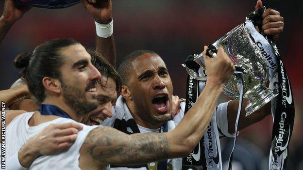 Swansea City celebrate winning the Capital One Cup