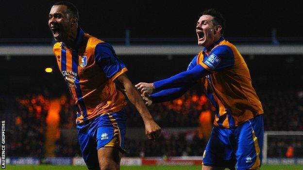Mansfield striker Matt Green celebrates another goal