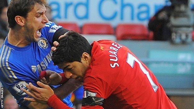 Chelsea defender Branislav Ivanovic (left) was bitten by Liverpool striker Luis Suarez