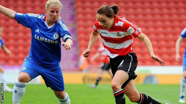 Aine O'Gorman (right) of Doncaster looks for a way past Kylie Davies