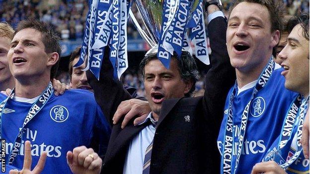 Jose Mourinho lifts the Premier League trophy